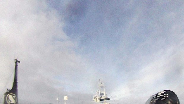 The Yushin Maru No.3 sprays a Sea Shepherd small boat crew with water cannon in a file picture.