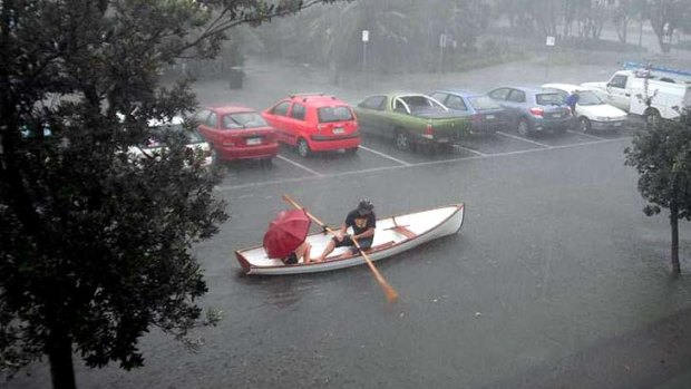 Locals row through a Sunshine Coast car park.  Photo: <B><A href= http://www.sunshinecoastdaily.com.au/ > Sunshine Coast Daily </a></b>