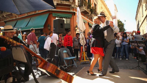 Dancers perform a Tango at Plaza Dorrego in San Telmo.