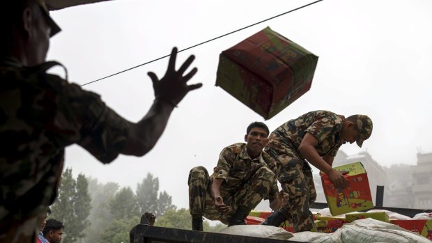 A box of relief supplies thrown on to a truck in Gorkha, Nepal, on Wednesday. 