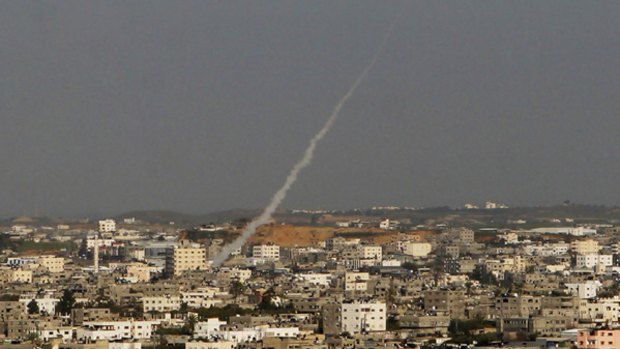 A Palestinian rocket heads for the Jewish town of Sderot, which the Israeli Government says has been subject to a relentless battery from Palestinian militants for eight years.