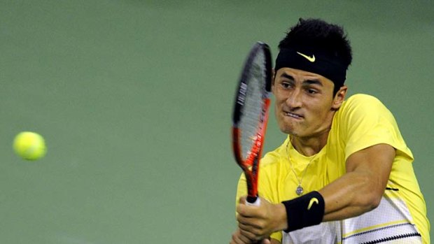 Top shot: Australia's Bernard Tomic will take on Ukraine's Alex Dolgopolov for a place in the Masters quarter-finals.
