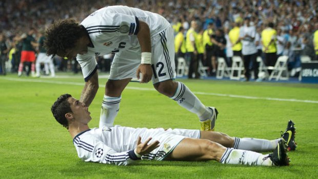 Real joy ...  Cristiano Ronaldo celebrates scoring the winner.