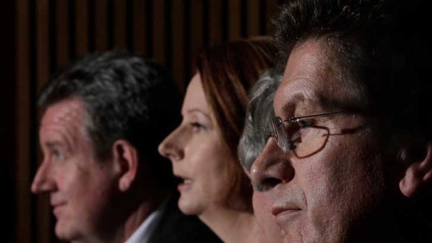 NSW Premier Barry O'Farrell, Prime Minister Julia Gillard and Victorian Premier Ted Baillieu at a press conference.