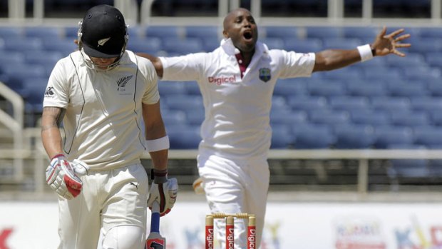 The West Indies' Tino Best celebrates claiming the wicket of New Zealand's Brendon McCullum on day one of the second Test in Kingston.