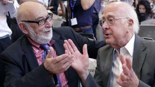 God on their side: British physicist Peter Higgs (right) talking with Belgium physicist Francois Englert.