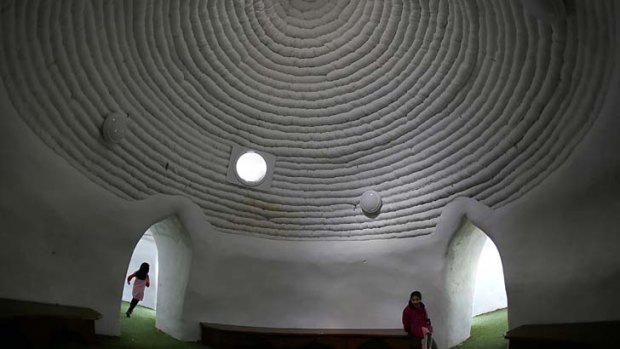 The domes, an invention of Iranian architect Nader Khalili, were originally meant for lunar settlements and were first employed in a refugee crisis after the 1990-91 Gulf war, but they work just fine for kids in west London too.