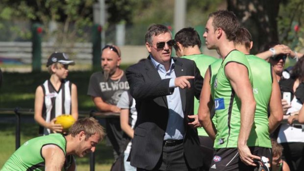 Pointing the way: Collingwood president Eddie McGuire with skipper Nick Maxwell at training yesterday.