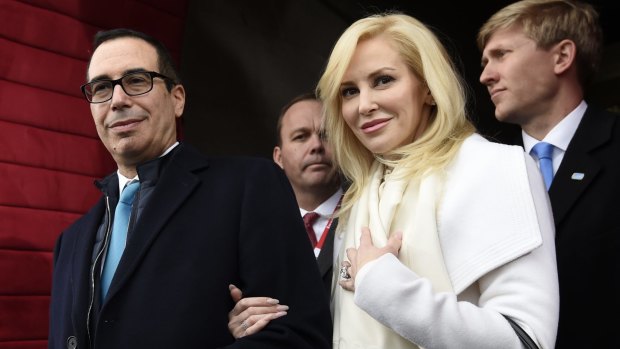 In this Friday, January 20, 2017, file photo, then Treasury Secretary-designate Stephen Mnuchin and his then-fiancee, Louise Linton, arrive on Capitol Hill in Washington, for the presidential inauguration of Donald Trump.