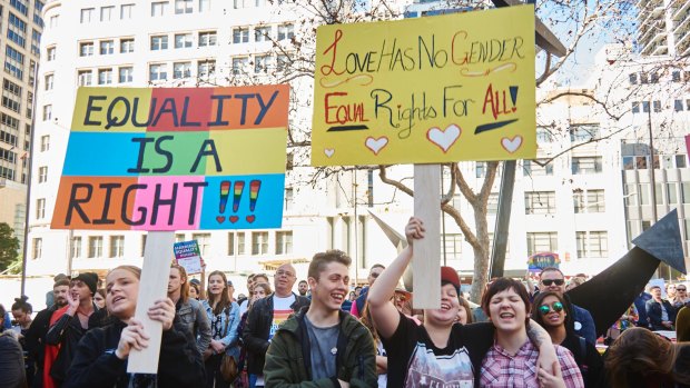 Protestors at a marriage equality rally outside Sydney Town Hall.