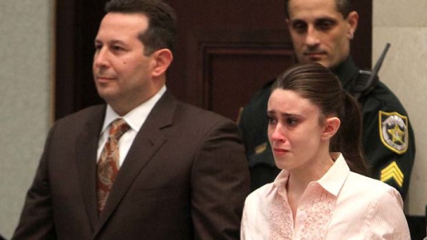Tears of relief ... Casey Anthony reacts to being found not guilty of the murder of her two-year-old daughter, at the Orange County courthouse in Orlando, Florida.