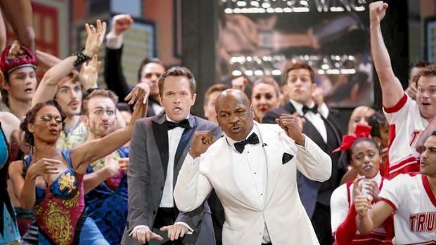 Neil Patrick Harris  and retired boxer Mike Tyson  perform during the opening number of American Theatre Wing's annual Tony Awards in New York.