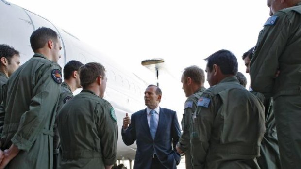 Tony Abbott speaking to troops at RAAF Base Williamtown: The Prime Minister has applauded Thursday morning's counter-terrorism operation, saying there was clear evidence the would-be terrorists planned to commit demonstration beheadings in Sydney.