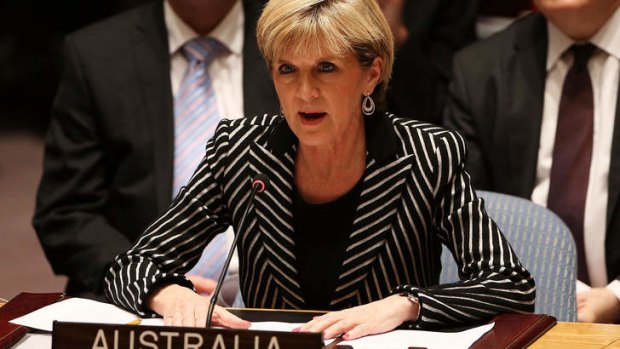 Foreign Minister Julie Bishop, pictured speaking at a meeting of the United Nations Security Council, has warned Russia that Australia is poised to increase sanctions.