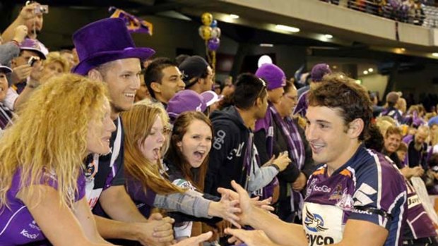 Billy Slater greets Storm fans at Etihad Stadium last Sunday. Melbourne Rebels rugby union club says it has not made an offer to recruit the star rugby league fullback.