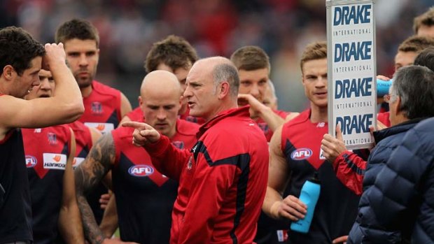 Gone ... Demons coach Dean Bailey addresss his team at quarter time during the round 19 AFL match between the Geelong Cats and the Melbourne Demons.