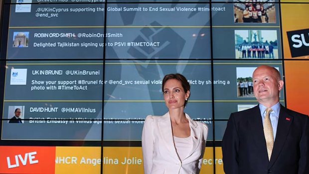 Hosting duties: Actress Angelina Jolie in her role as UN Special Envoy attends the Global Summit To End Sexual Violence In Conflict with British Foreign Secretary William Hague.