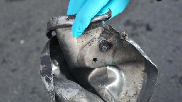 Evidence ... Boston Marathon bomb scene pictures taken by investigators show the remains of an explosive device.