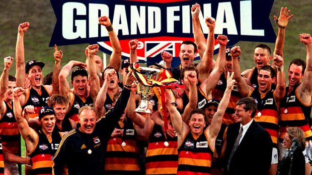 Flashback to 1998: The Crows celebrate along with coach Malcolm Blight after winning the flag.