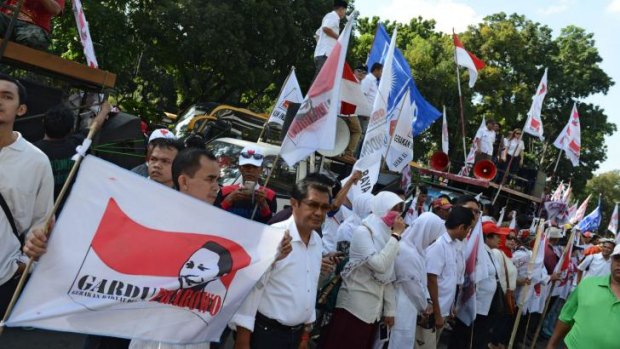 Supporters of Prabowo Subianto, the losing candidate in Indonesia's presidential election, gather outside the constitutional court to back his challenge to the official result.