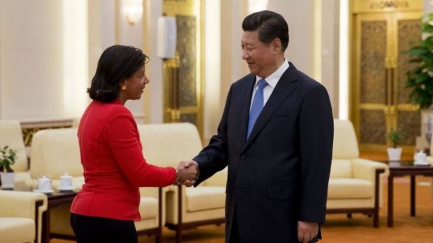 US national security adviser Susan Rice shakes hands with Chinese President Xi Jinping. 