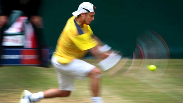 Perpetual motion ... Lleyton Hewitt will head to Wimbledon full of confidence after upsetting Roger Federer in Halle.