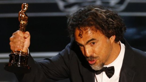 Director Alejandro Inarritu accepts the Oscar for Best Director for his film <i>Birdman</i> at the 87th Academy Awards.