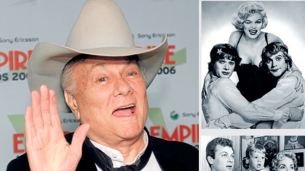Always the showman, Tony Curtis in London in 2006 (left), with Jack Lemmon and Marilyn Monroe in <em>Some Like It Hot</em> in 1959 (above) and with wife Janet Leigh in 1959 (below). Actress daughter Jamie Lee Curtis is the newborn.