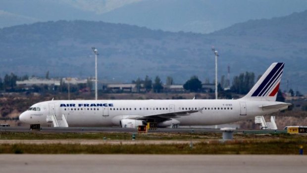 The Air France plane that was suspected of carrying a passenger with Ebola is seen on the runway at Madrid Barajas airport.