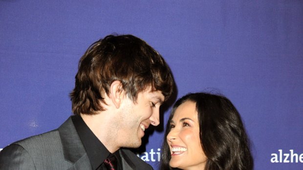 Someone to watch over her ... Demi Moore and Ashton Kutcher.