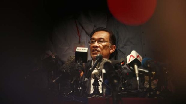 Malaysia's opposition leader Anwar Ibrahim addresses media during a news conference in Kuala Lumpur.  Photo: Reuters
