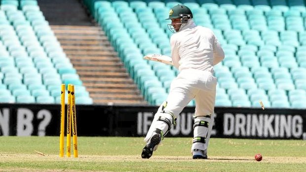 Death rattle ... Phillip Hughes is bowled by Rory Kleinveldt.