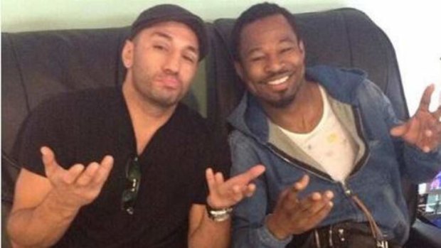 Shane Mosley poses for an Instagram selfie with sparring partner Sergio Mora at Sydney airport.