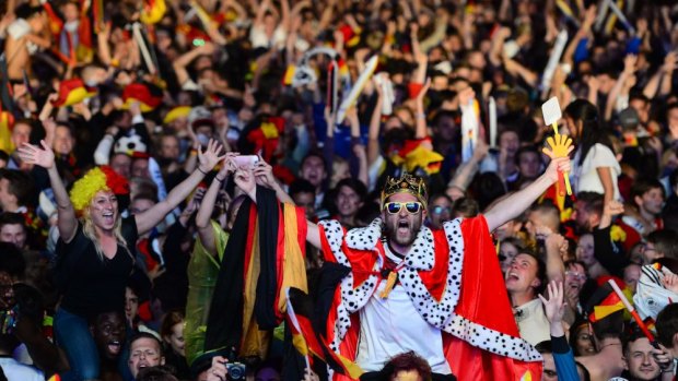 German fans react to Germany's winning goal in the World Cup final.