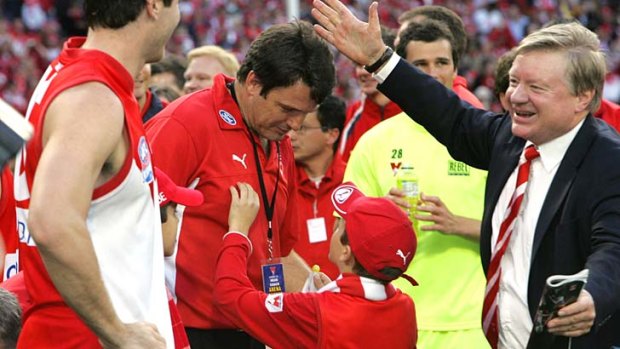 Happier times: Sydney coach Paul Roos and chairman Richard Colless.
