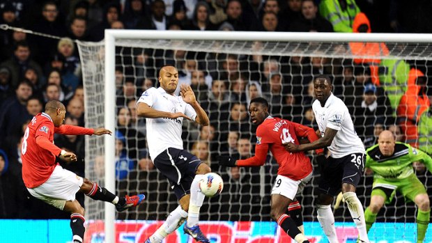 Ashley Young scores one of his two goals during Manchester United's 3-1 win over Tottenham Hotspur.