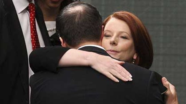 Julia Gillard hugs Ed Husic after his maiden speech.