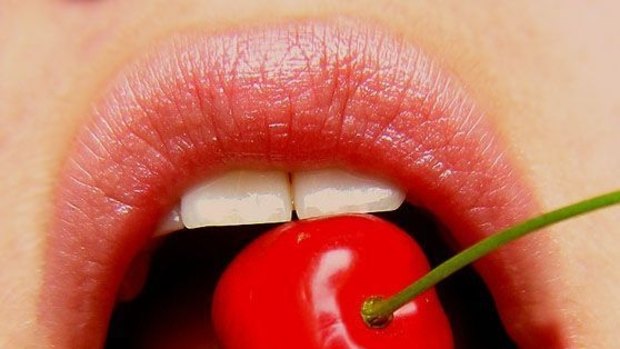 Cherry-red lips.