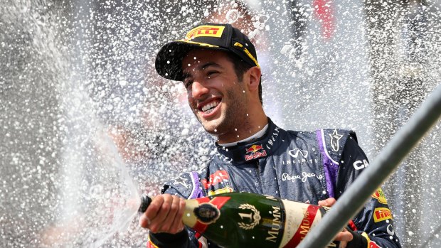 Champagne racing: The sight of Daniel Ricciardo celebrating on the podium became a familiar one in 2014, with the Australian winning three grands prix. 