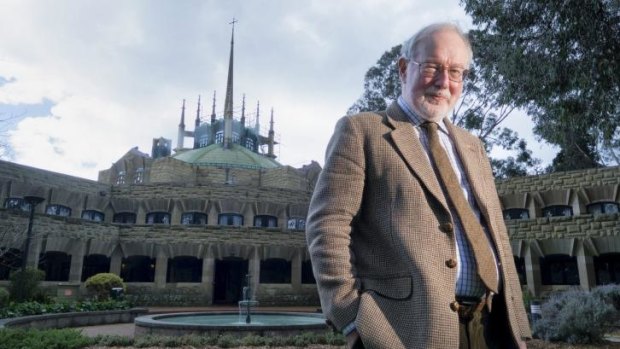 Spiritual home: Conductor Richard Divall outside  Melbourne University's Newman College dome.