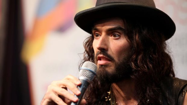Russell Brand, who will stage a comedy show in Melbourne at Rod Laver Arena in December, speaks to the media at the ARIA awards in Sydney.