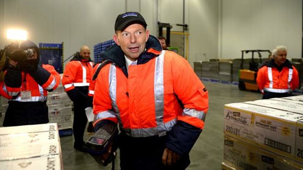 Seeking the stamp of approval: Tony Abbott at a cold storage facility in Melbourne.