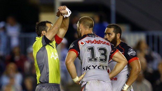Konrad Hurrell of the Warriors is put on report by referee Gavin Morris during the round nine NRL match between the Sharks and the Warriors at Remondis Stadium.