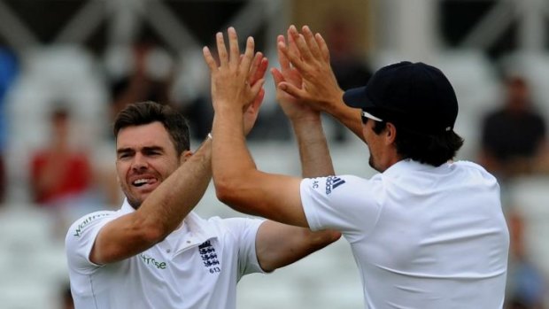 Happier times: England's James Anderson celebrates the wicket of India's Ravindra Jadeja during the drawn first Test at Trent Bridge.
