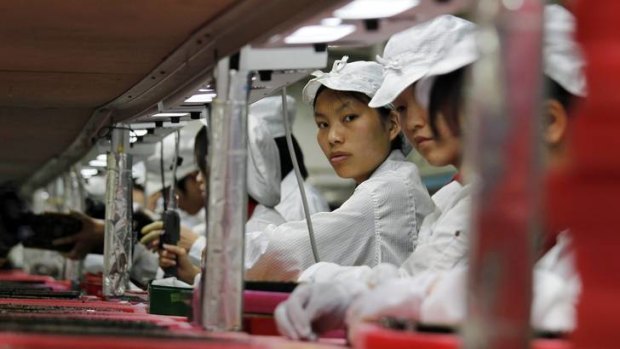 Protests ... Foxconn workers have halted production in a dispute over conditions.