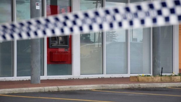 It's alleged the two men demanded money from an elderly woman at an ATM in Bunbury.