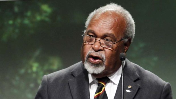 Absent for five months while recovering from heart surgery in Singapore ... Sir Michael Somare.