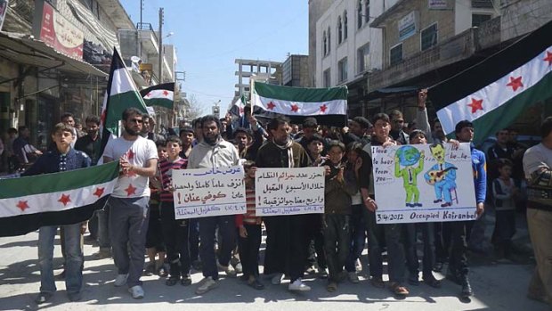 Demonstrators near Idlib protest this week against President Bashar Al-Assad.