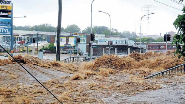 Raging floodwaters roar through Toowoomba, 125 kilometres west of Brisbane.