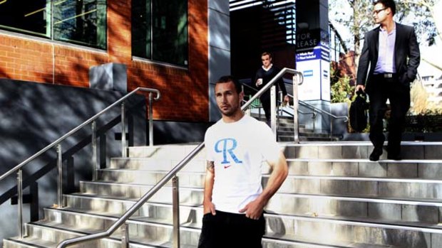 Wanted man ... Quade Cooper leaves Australian rugby headquarters yesterday as the 15-man code tries desperately to keep him.